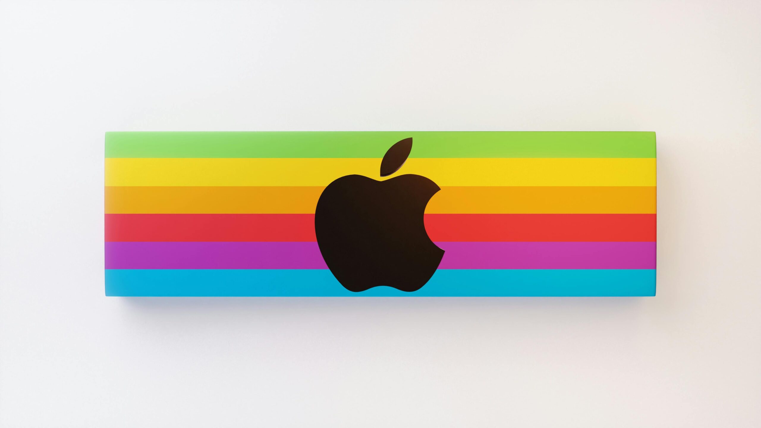 Home Vibrant Apple logo design featuring rainbow colors on a white background.